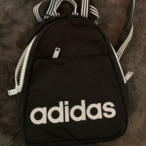 Never used Adidas small backpack. Perfect for keys, wallet, phone, etc.